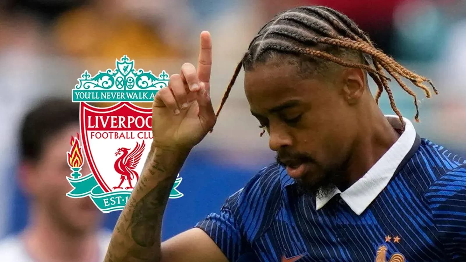 Player gesturing during match with Liverpool logo