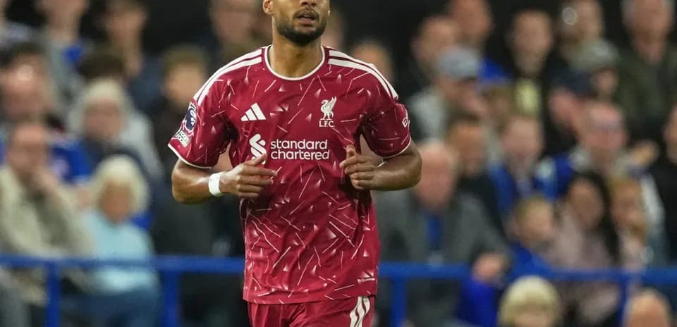 Player in Liverpool kit during match action