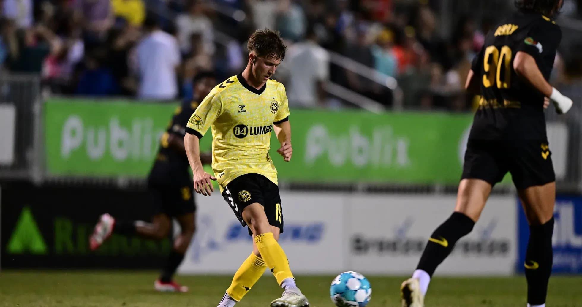 Player passing the ball during Charleston Battery match