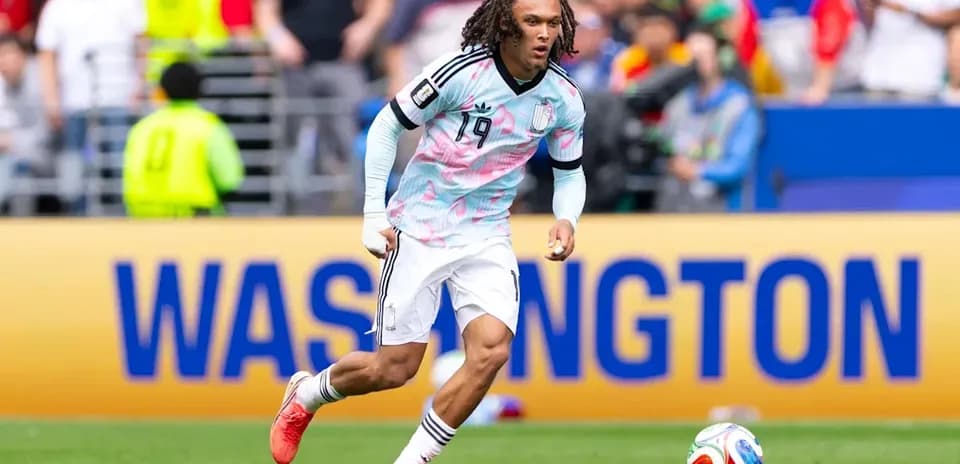 Player running with ball during match in Washington