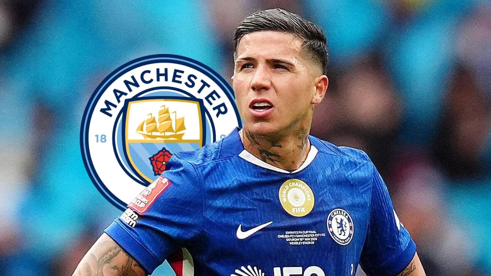 Player in blue jersey with Manchester City logo background