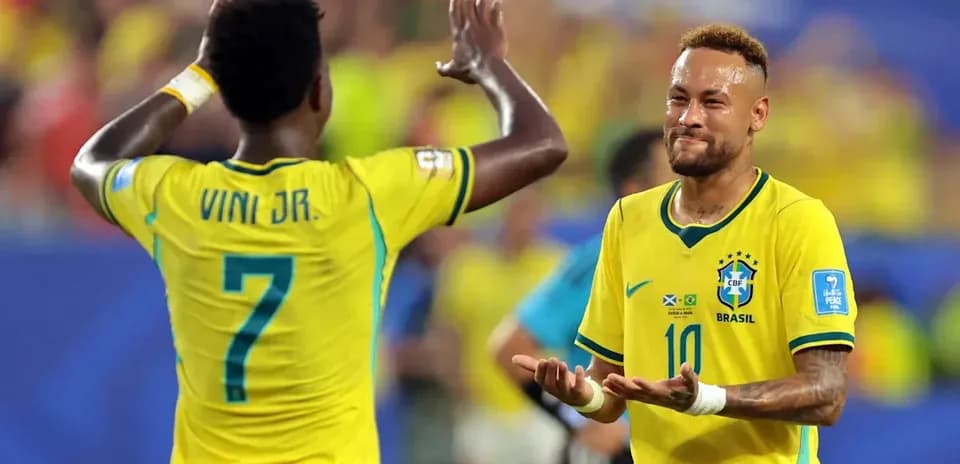 Neymar and Viní Jr. celebrating during a match