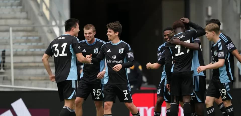 Players celebrating a goal for Minnesota United II
