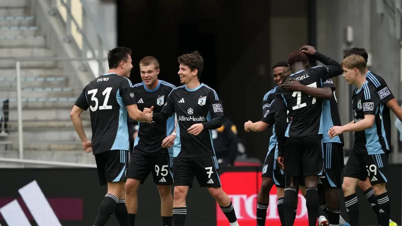 Players celebrating a goal for Minnesota United II