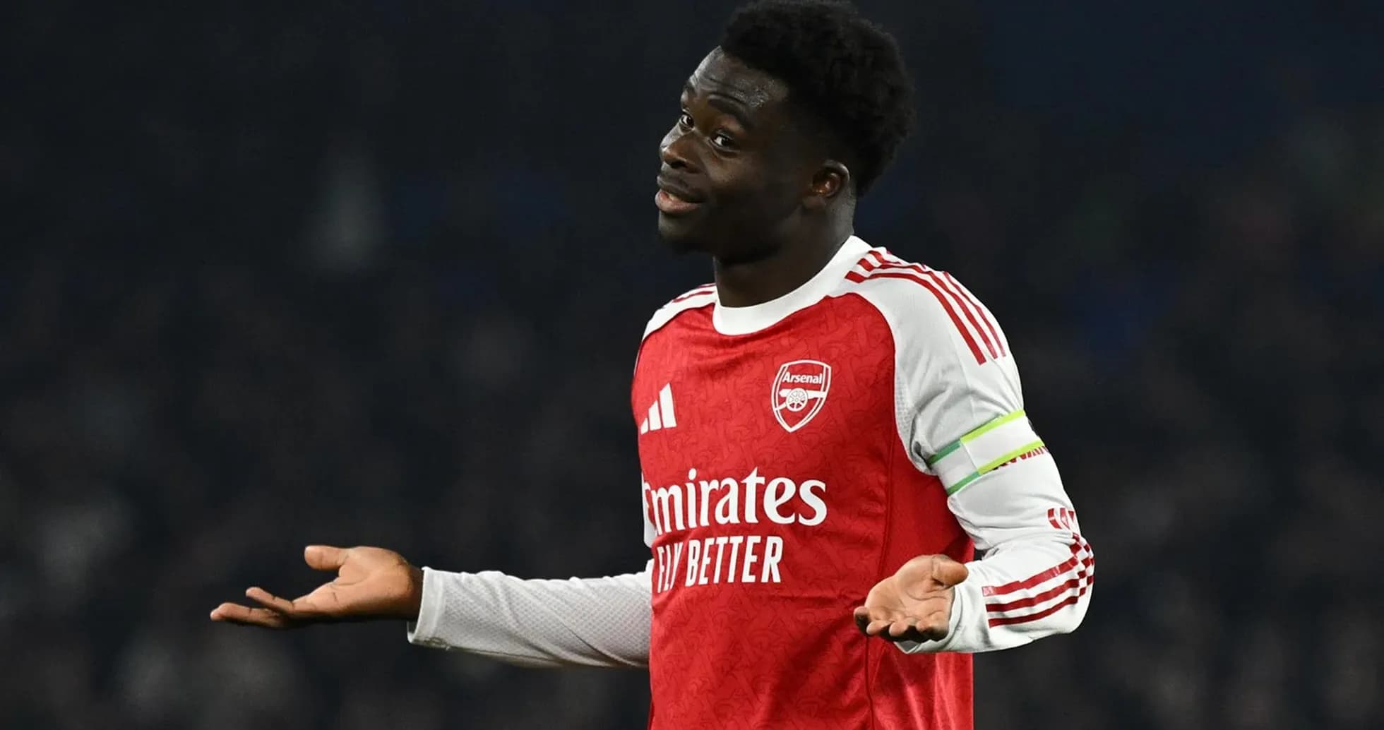 Arsenal player gesturing during match