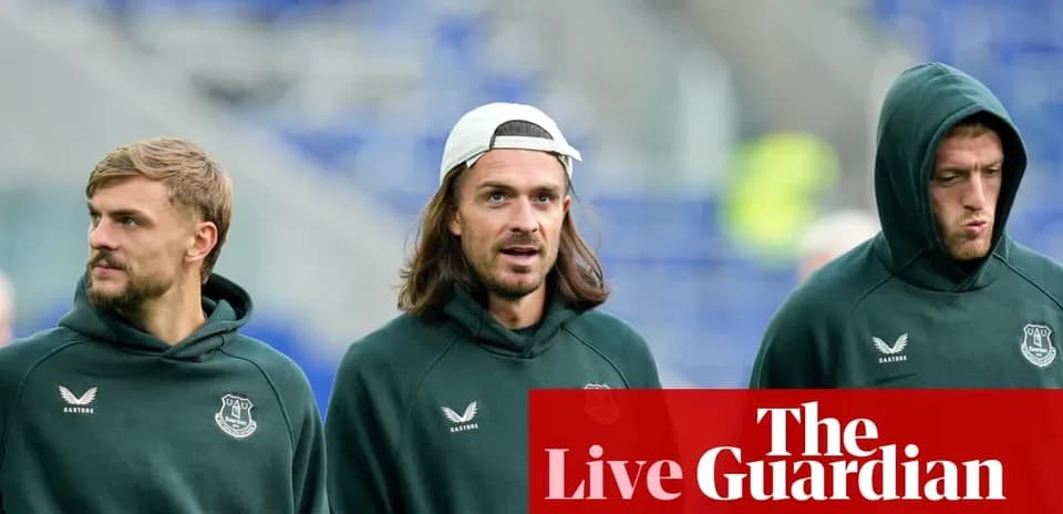 Three players walking together in team hoodies
