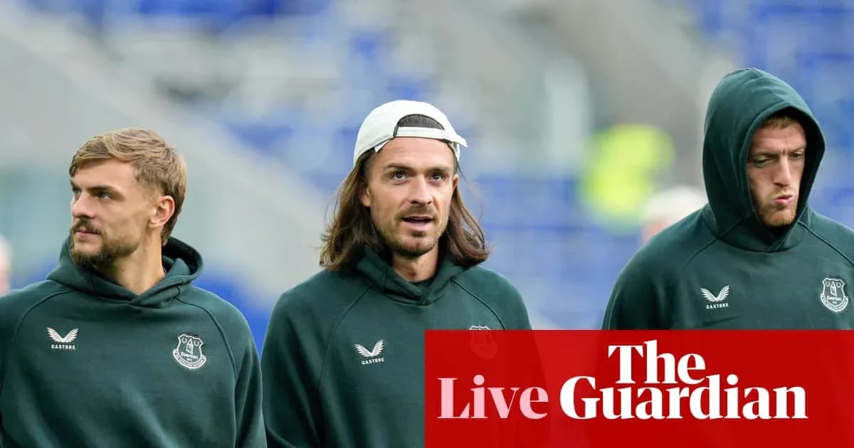 Three players walking together in team hoodies
