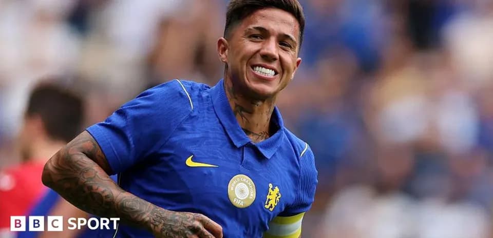 Player celebrating in blue Chelsea jersey during match