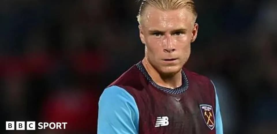 Player in West Ham kit during match preparation