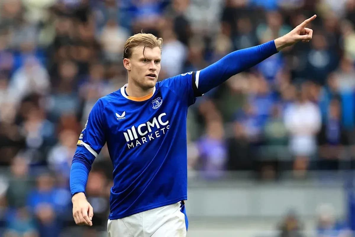 Player in blue jersey gesturing during match