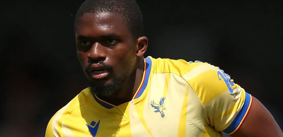 Player in yellow jersey running on the field