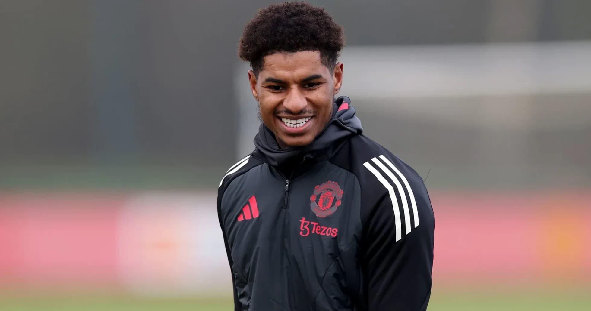 Player smiling during Manchester United training session