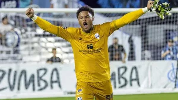 Goalkeeper celebrating after a successful save