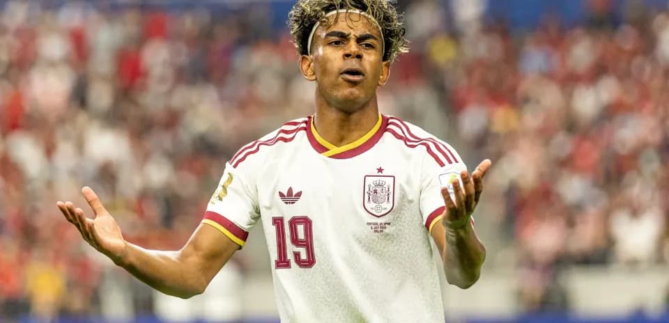 Player gesturing during a soccer match for Spain