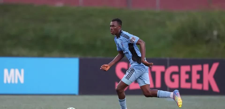 Player running with ball during Minnesota United II match