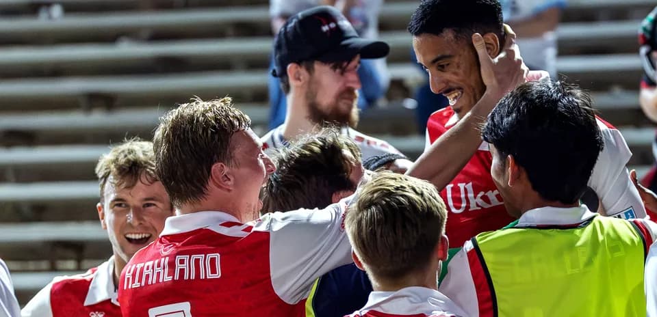 Players celebrating a goal during the match