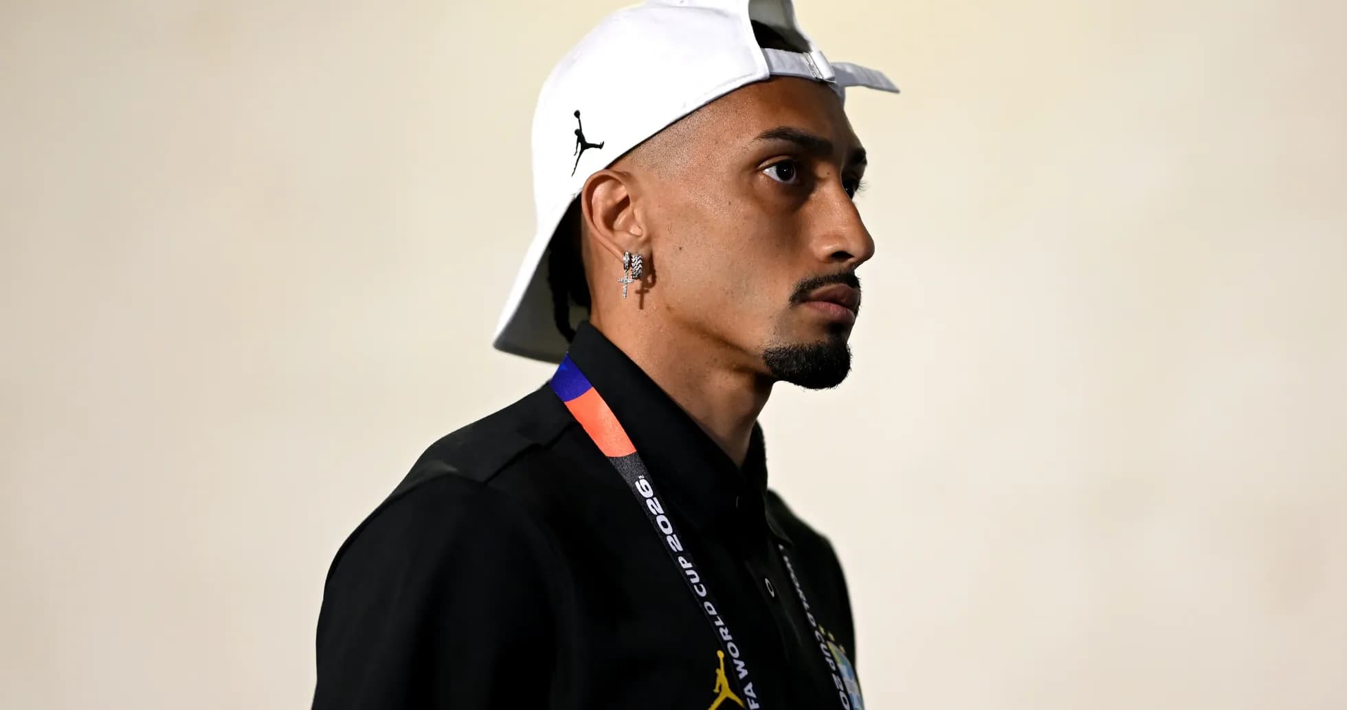 Athlete wearing cap and FIFA World Cup badge