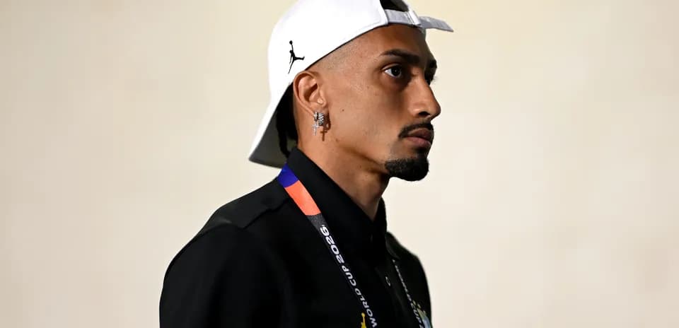 Athlete wearing cap and FIFA World Cup badge