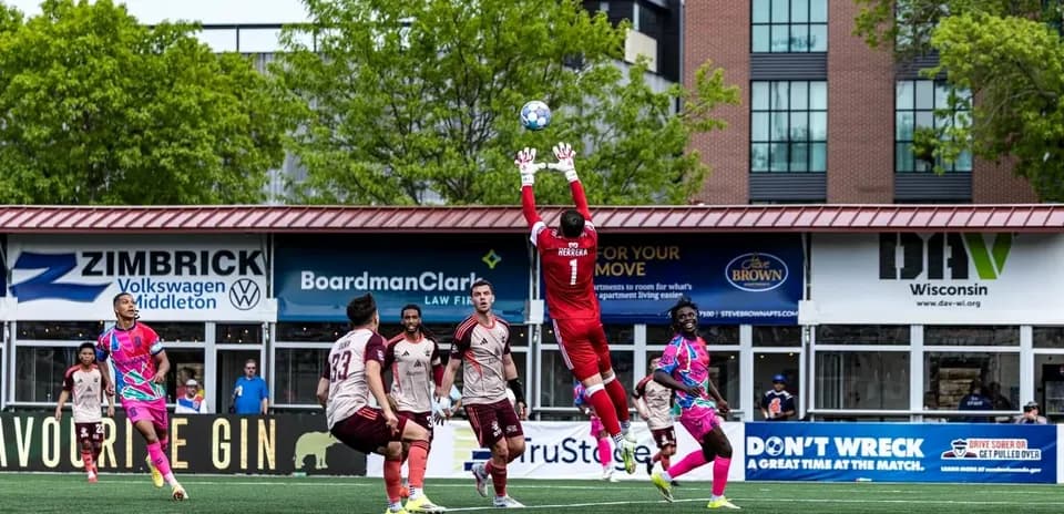 Goalkeeper making a save during match action