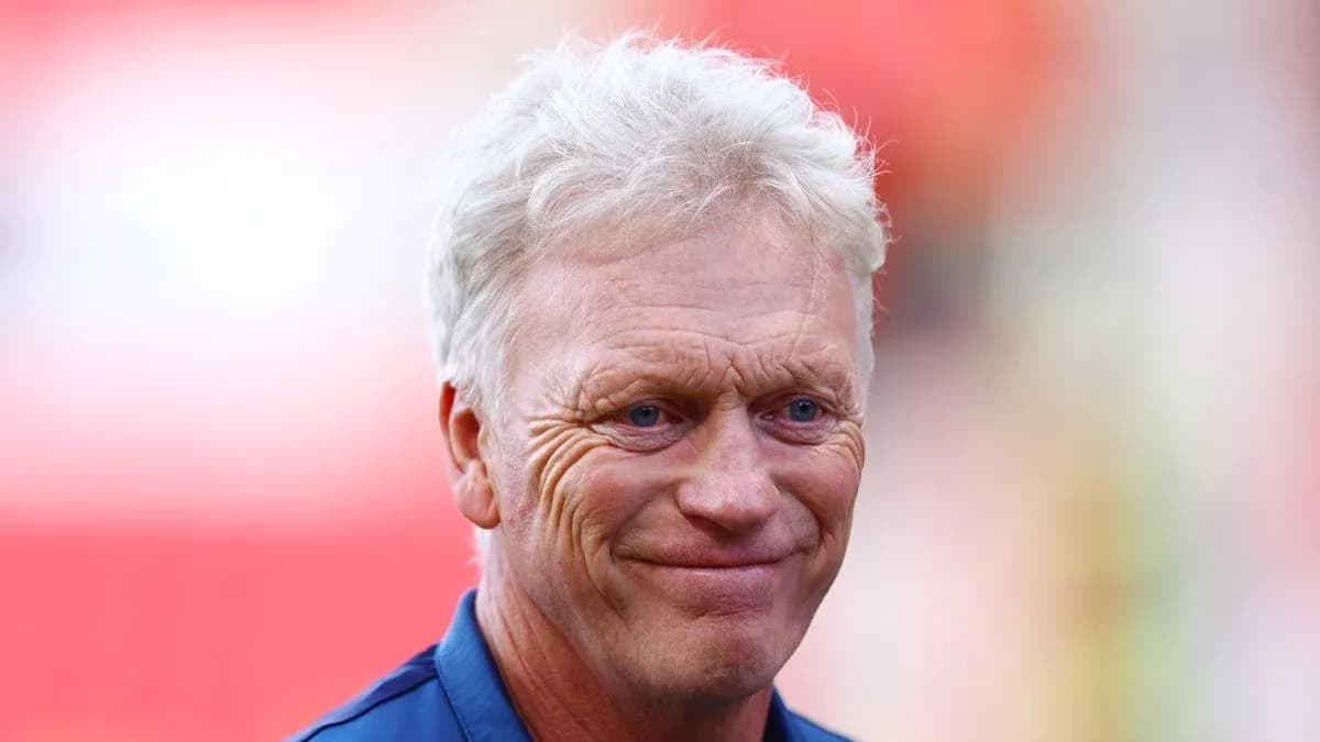 Manager smiling before the match at the stadium