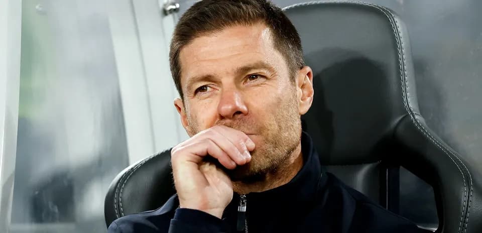Coach observing the match from the sidelines