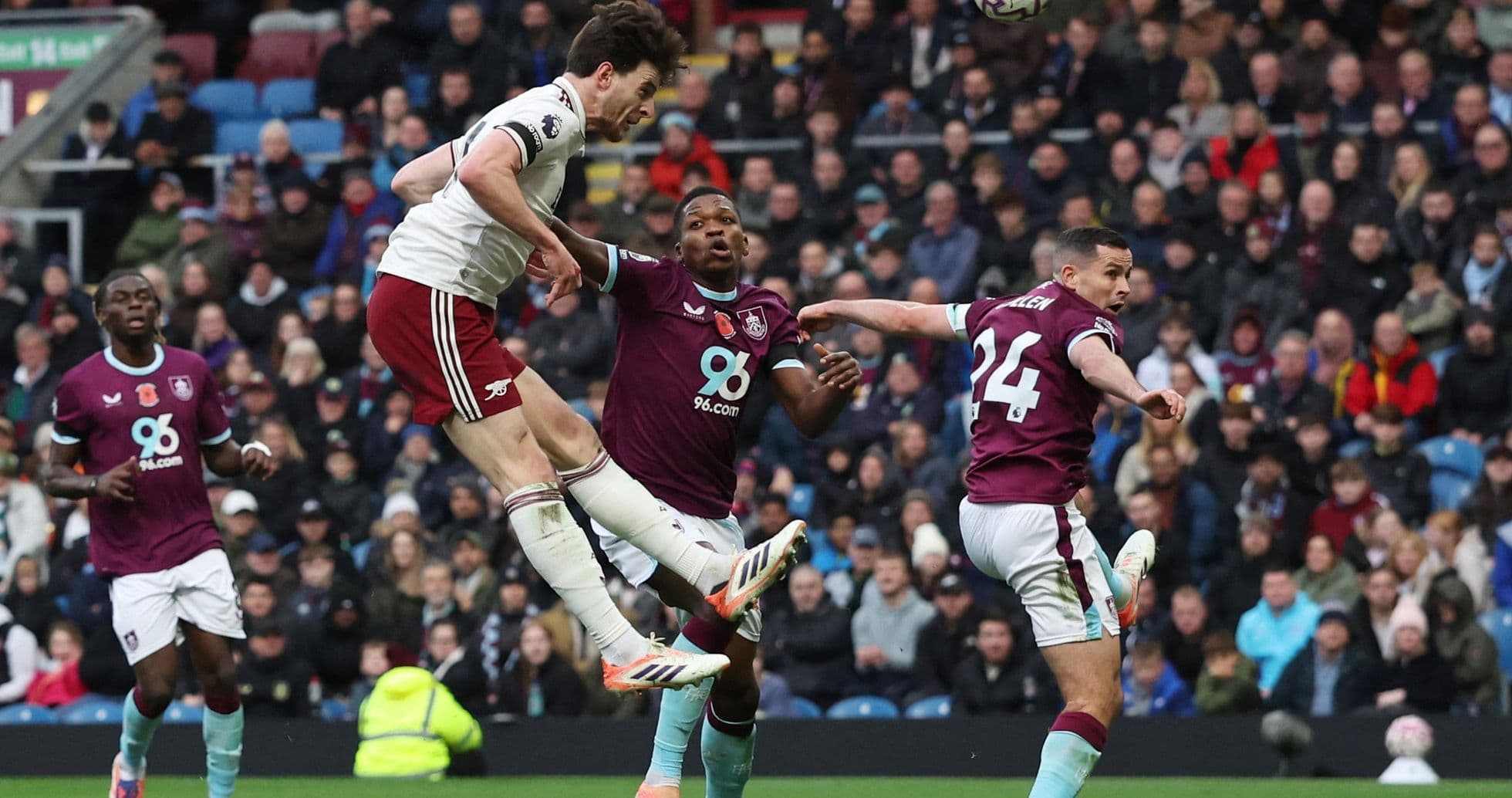 Arsenal player heading the ball against Burnley