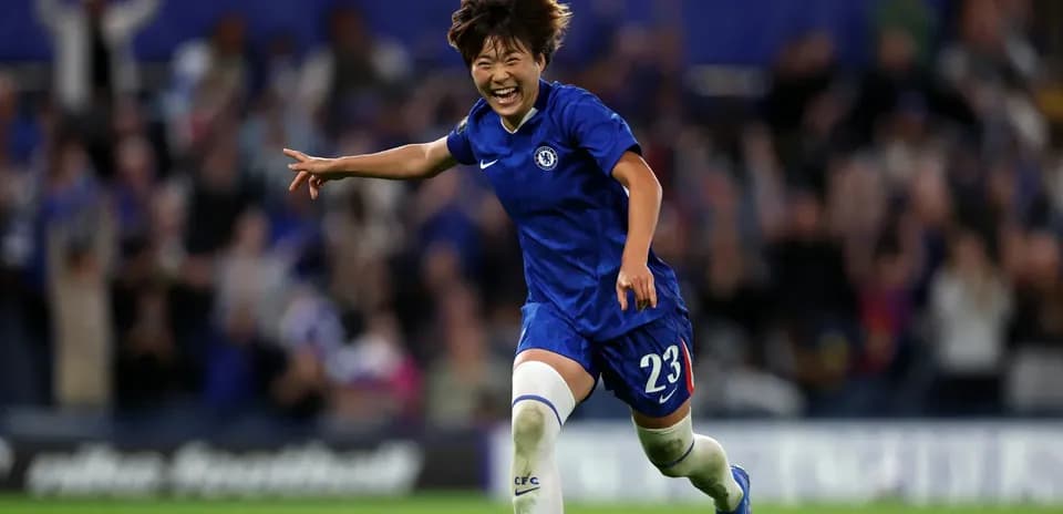Player celebrating a goal in Chelsea kit