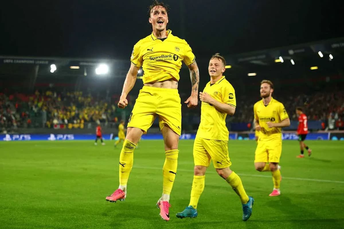 Players celebrating during UEFA Champions League match