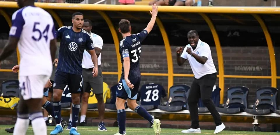 Players celebrating during Orlando City II match