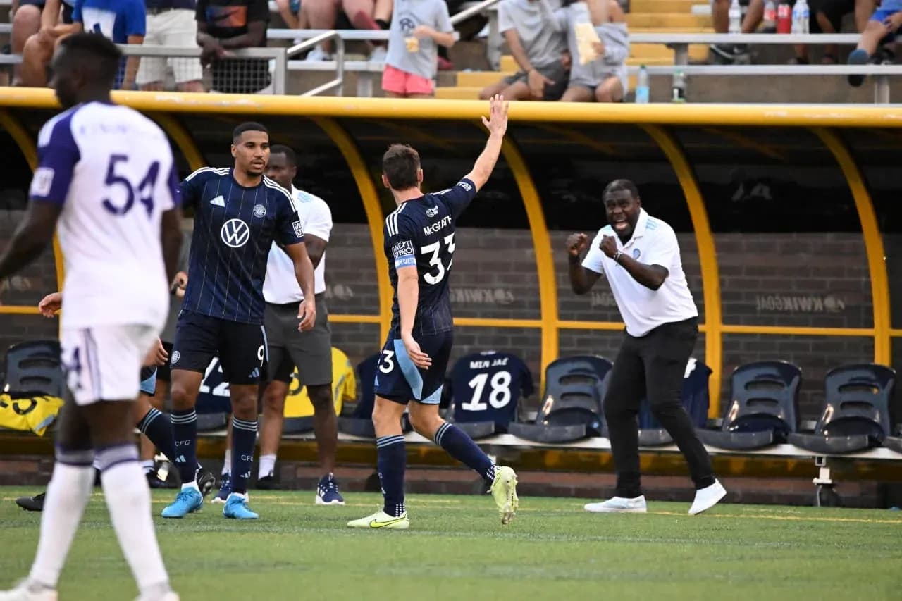 Players celebrating during Orlando City II match