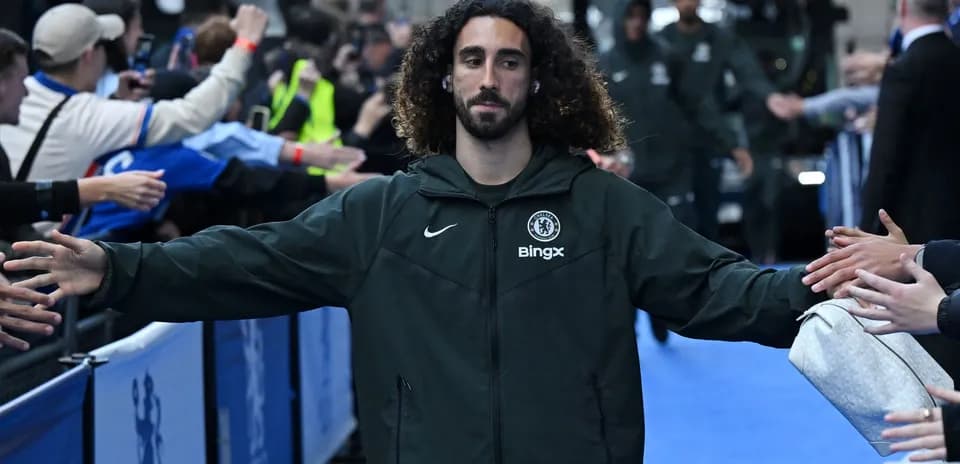 Player greeting fans before the match at stadium