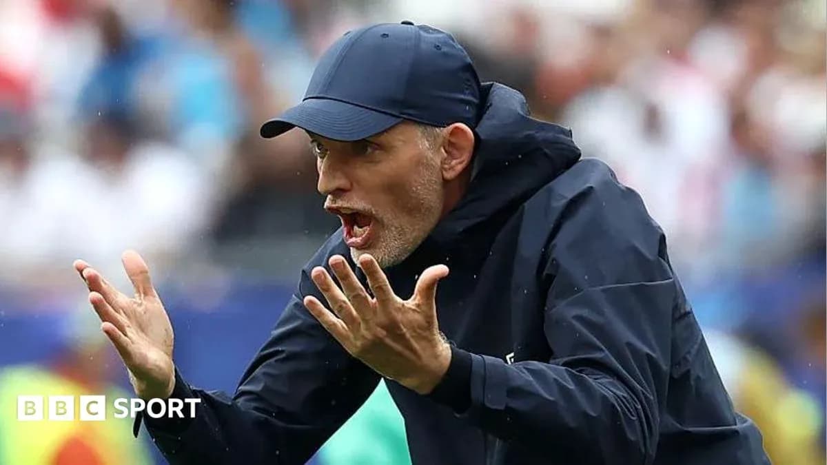 Coach gesturing passionately during a match