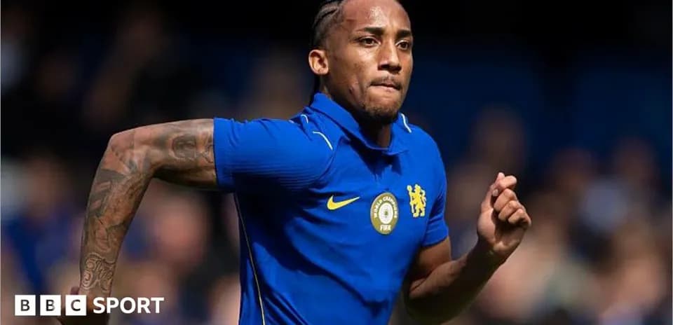 Player running in blue Chelsea kit during match