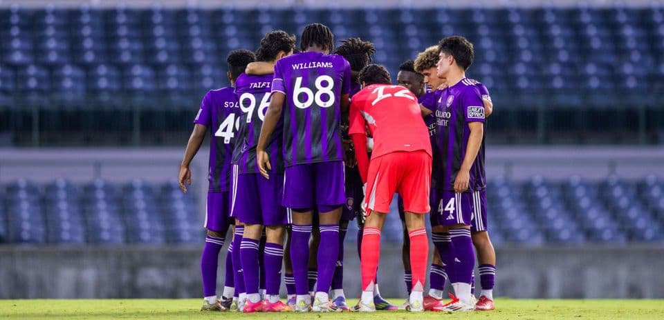 Orlando City II players huddling before match