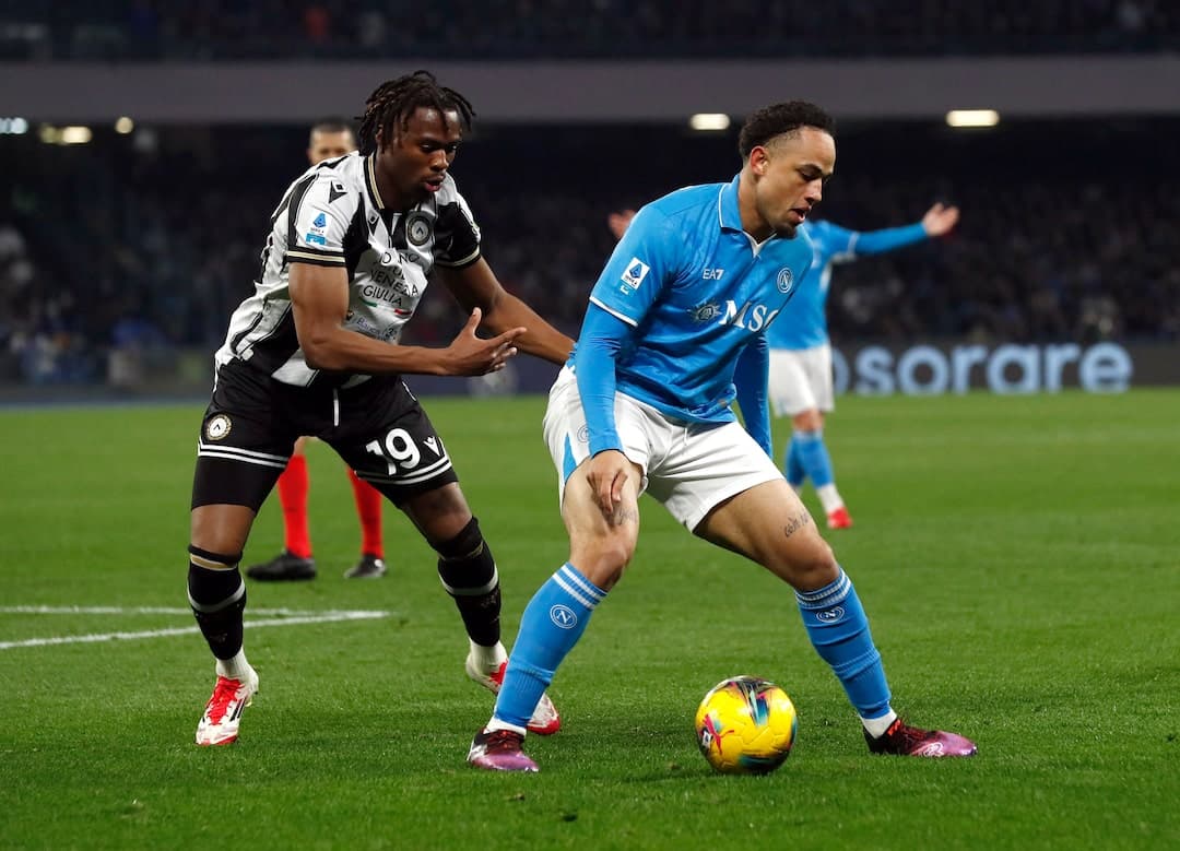 Player tackling during Napoli vs Udinese match