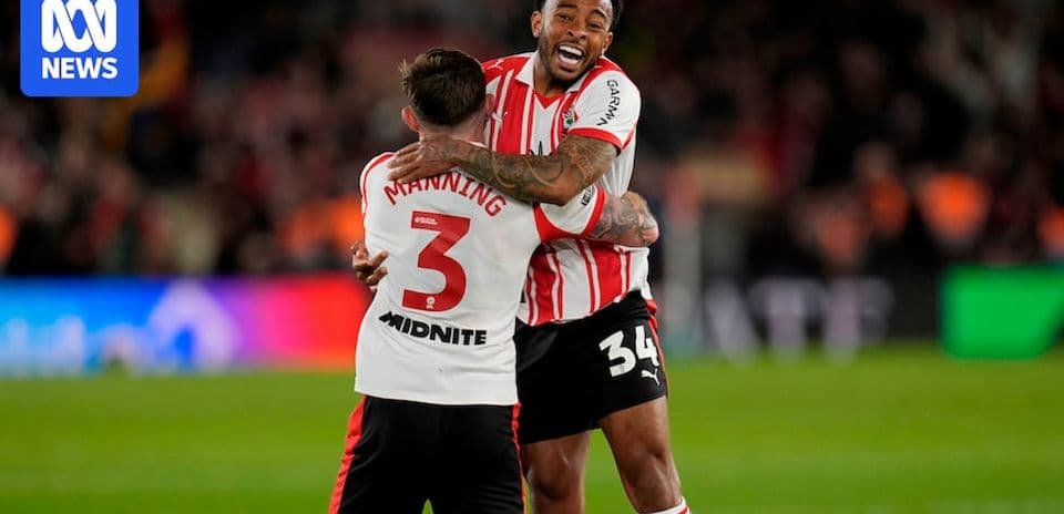 Two players celebrating after a match