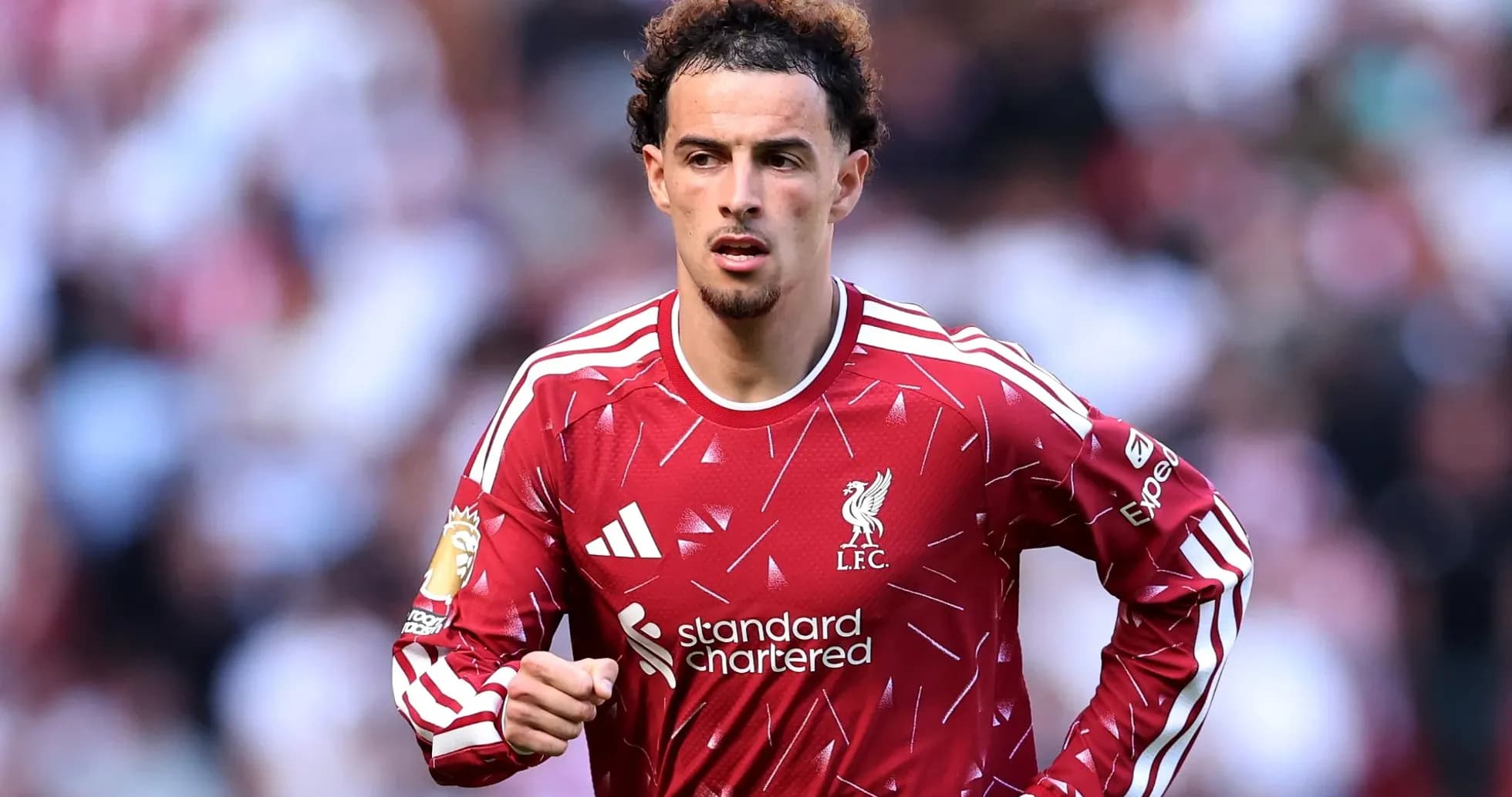 Player in Liverpool kit during match action