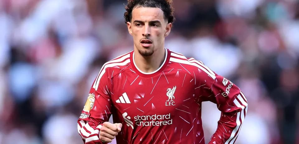 Player in Liverpool kit during match action