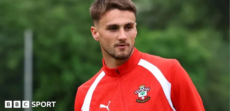 Player in Southampton FC training gear outdoors