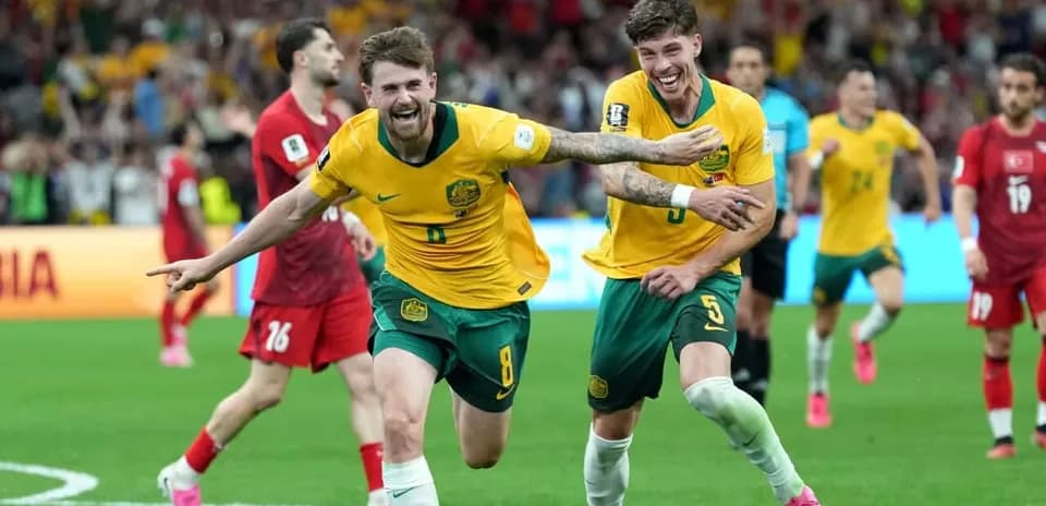 Australian players celebrating a goal in match