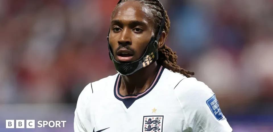Player wearing England kit during match action