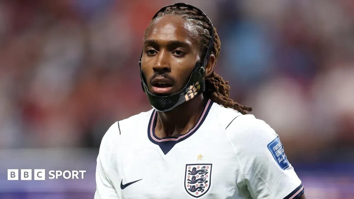 Player wearing England kit during match action