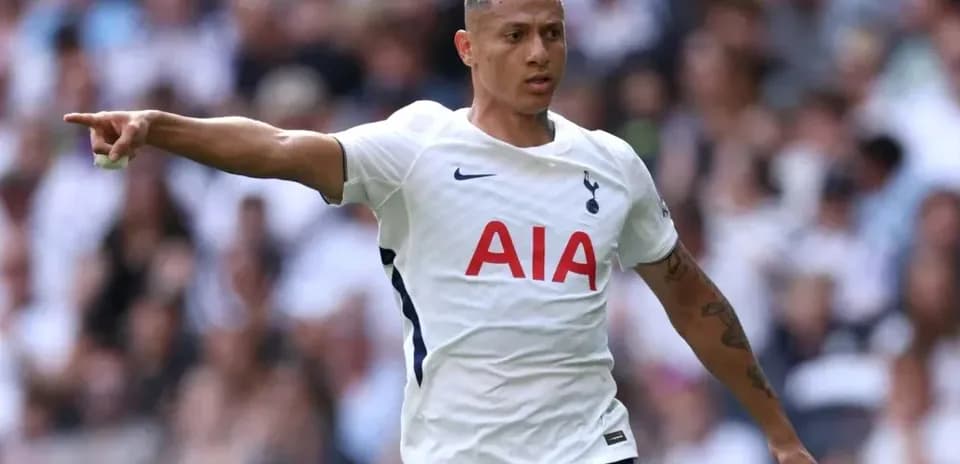 Player gesturing during Tottenham match on field
