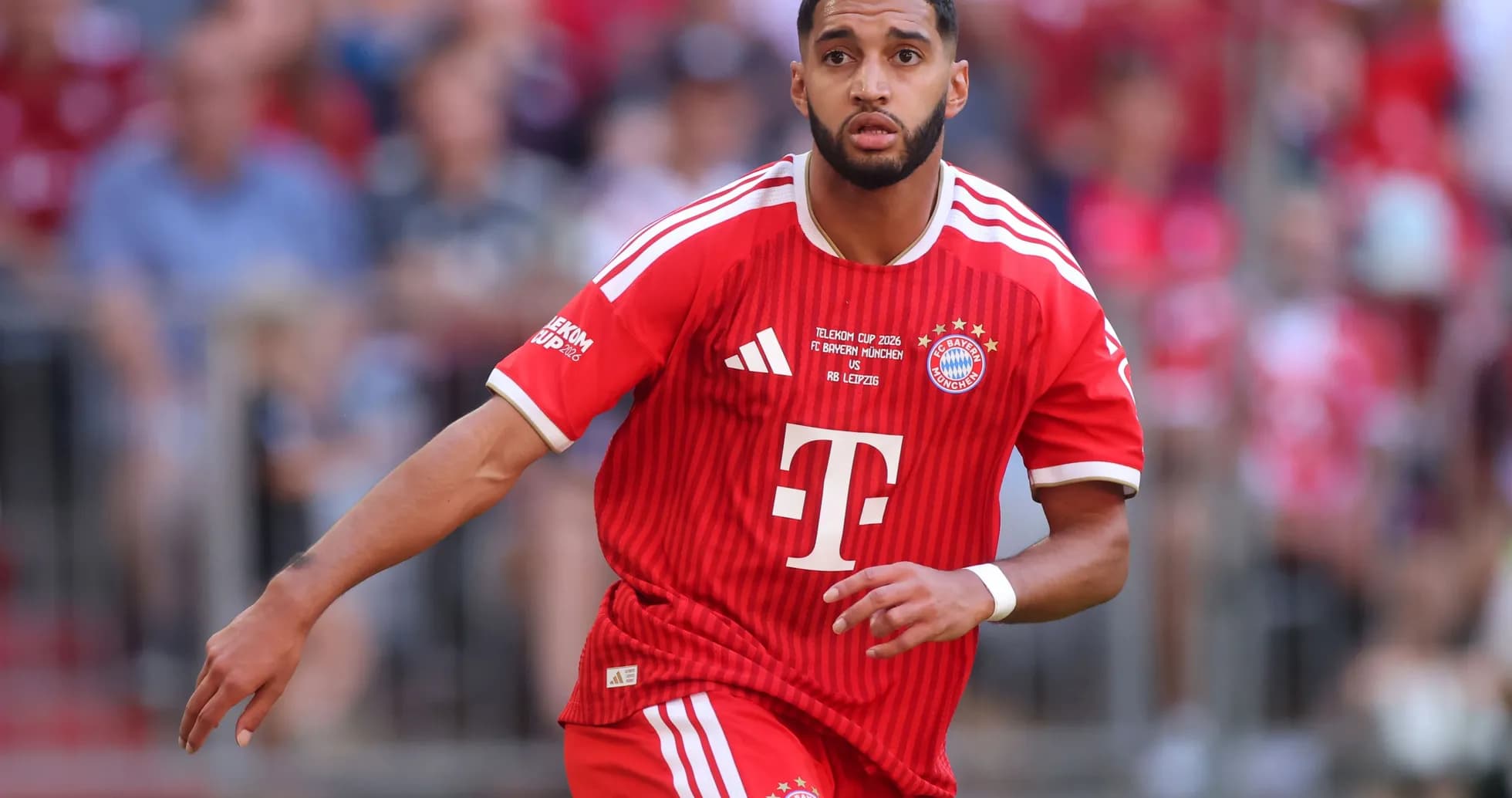 Player in red Bayern Munich kit during match