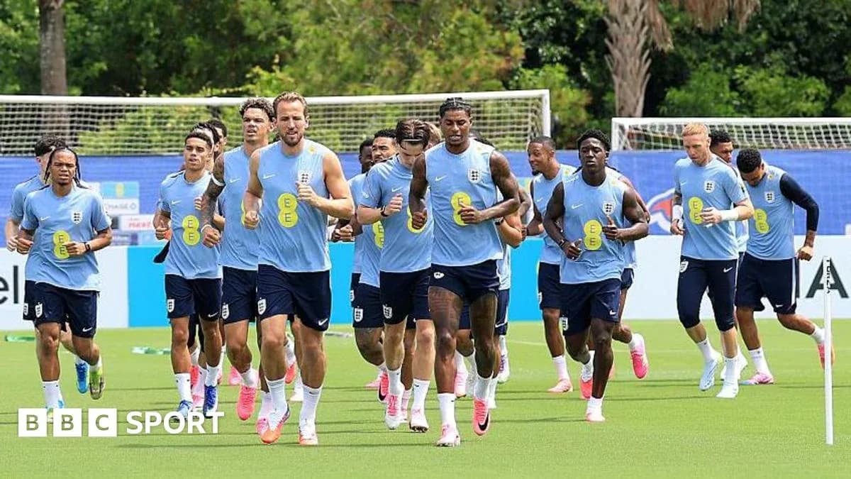England team running during training session on pitch