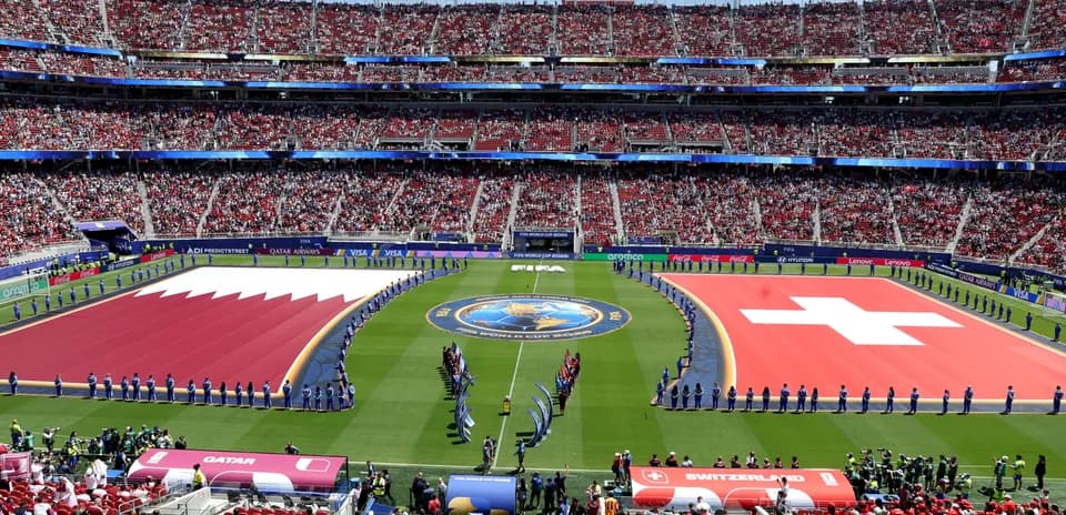 Qatar and Switzerland flags displayed before match