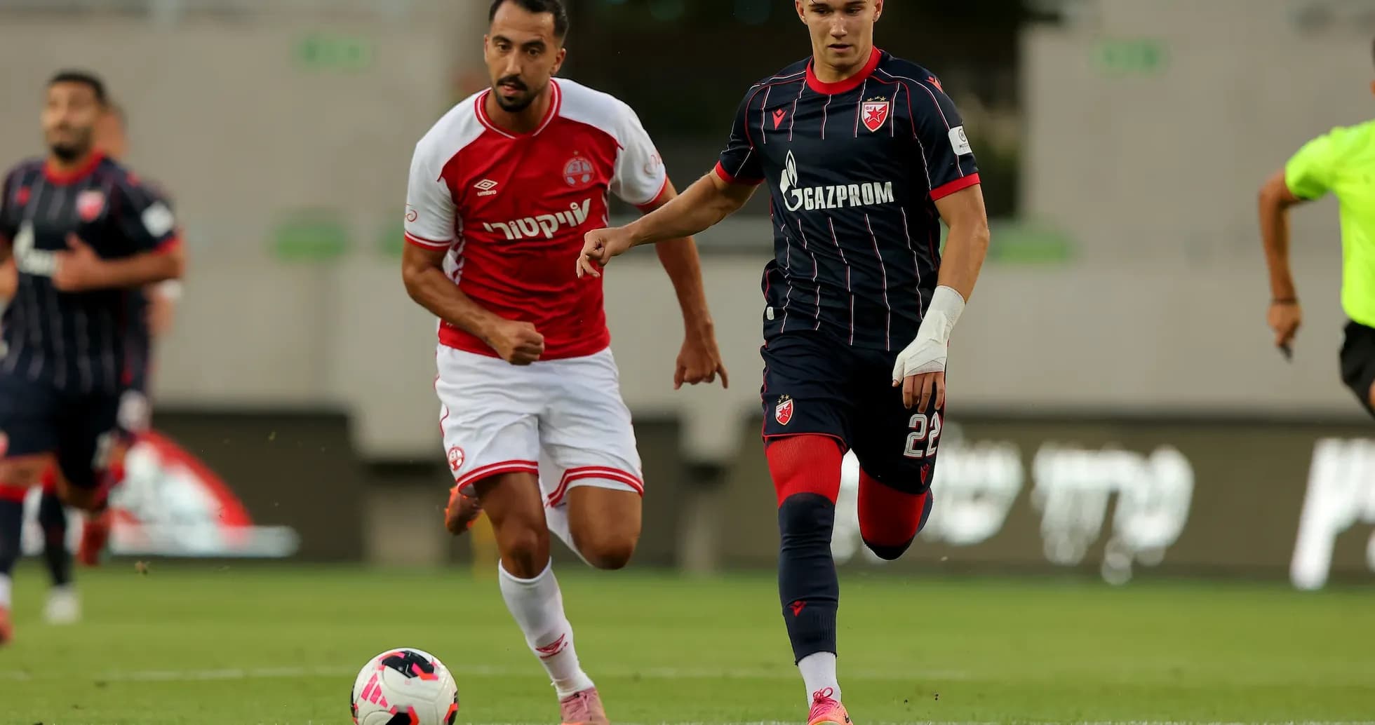 Players competing during UEFA Champions League match