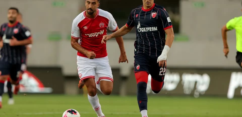 Players competing during UEFA Champions League match