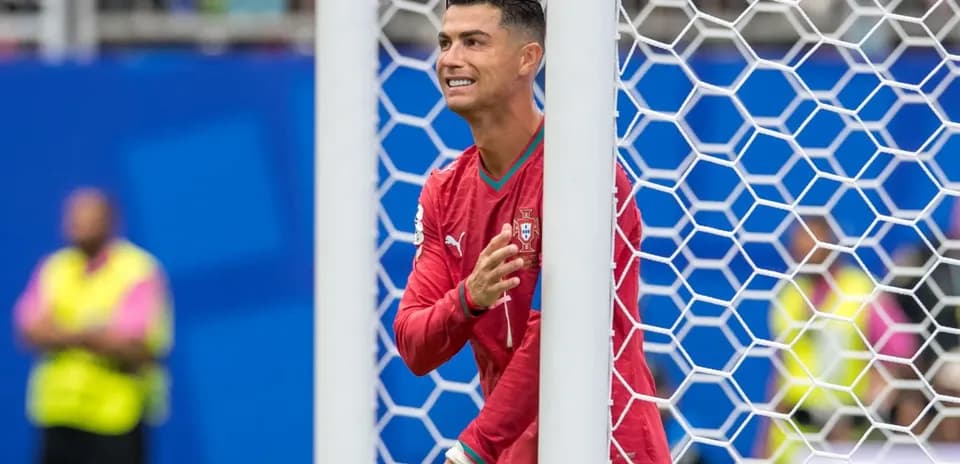 Cristiano Ronaldo in Portugal kit near goalpost