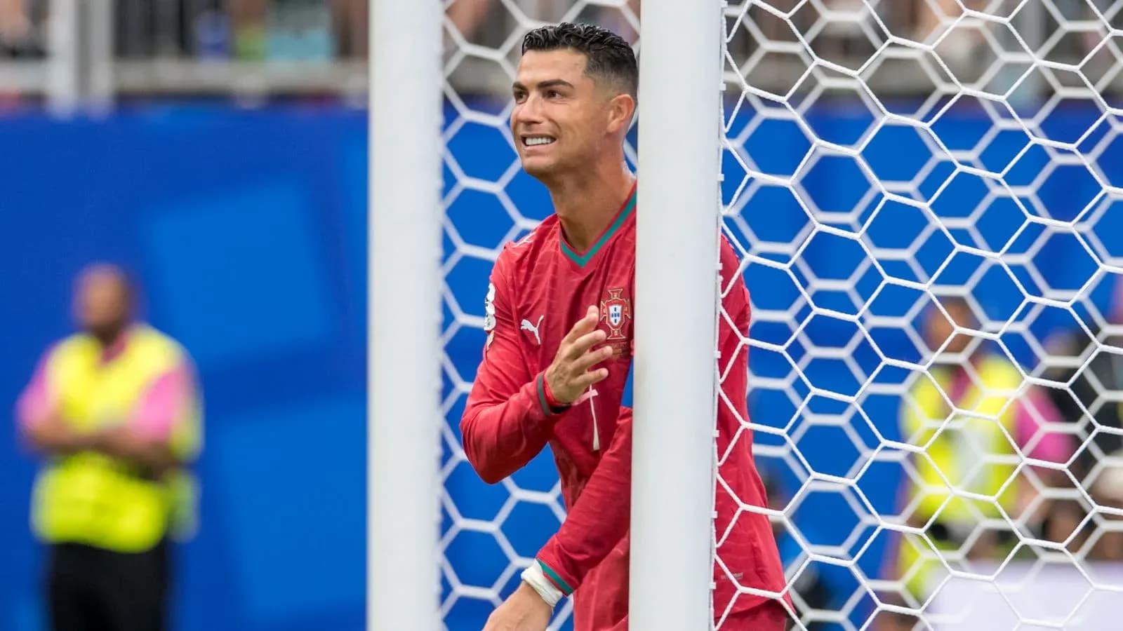 Cristiano Ronaldo in Portugal kit near goalpost